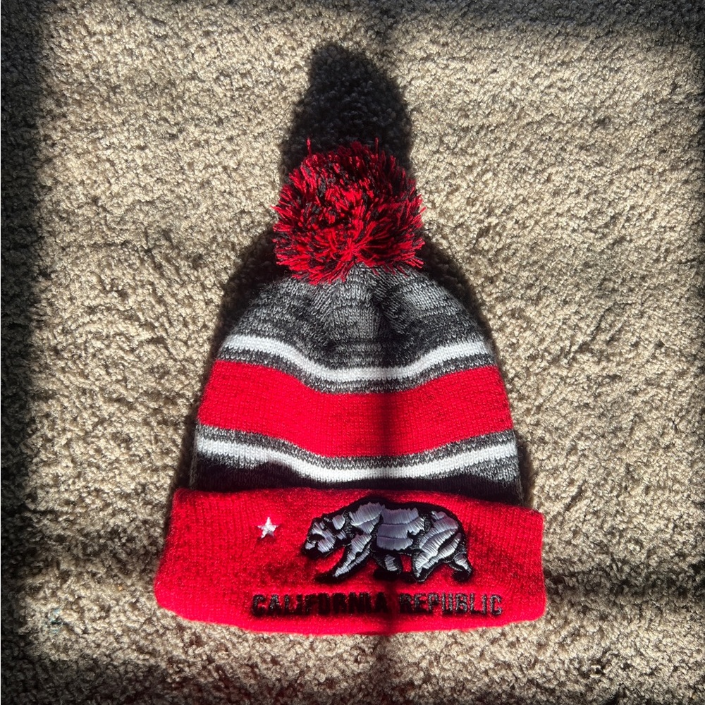 California Republic multi color beanie with fur ball